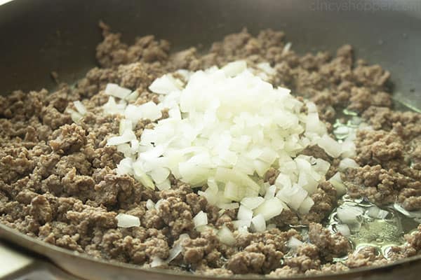 Ground beef and onion cooking in a pan