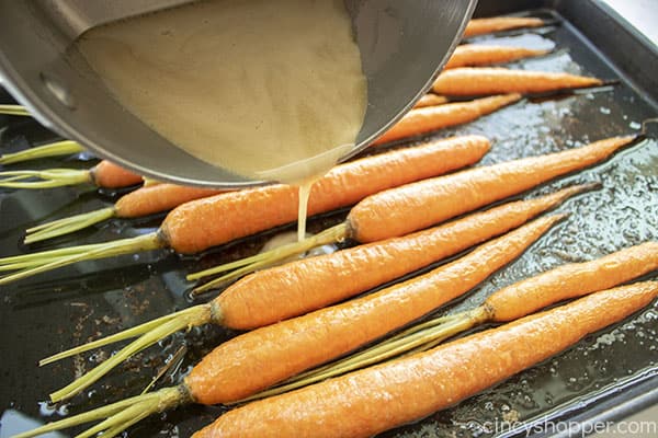 Pouring glaze on the carrots