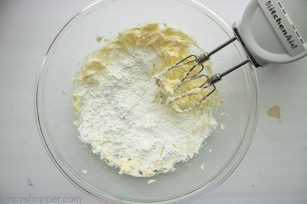 Powdered sugar added to creamed butter
