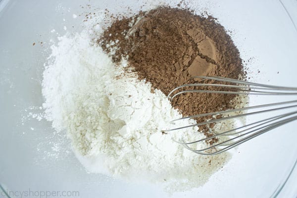 Dry ingredients in a bowl with whisk