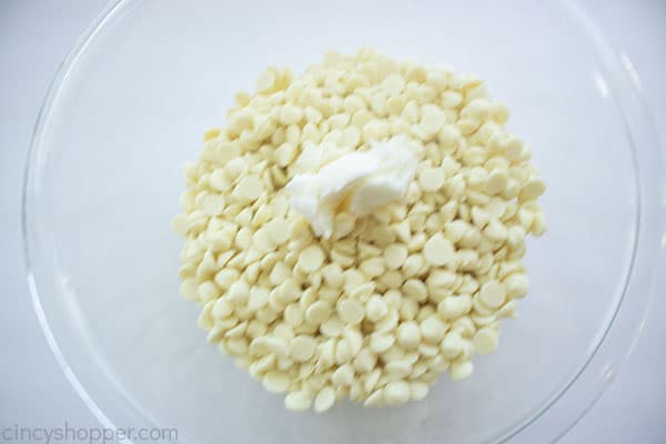 White chocolate chips with shortening in bowl