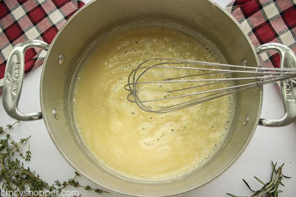 Roux in a pan with whisk