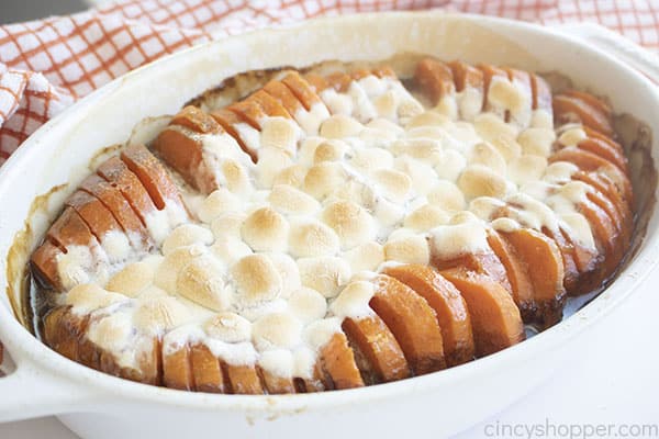 Sliced sweet potatoes in a casserole dish