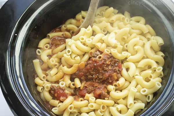 Pasta elbows added to meat sauce 