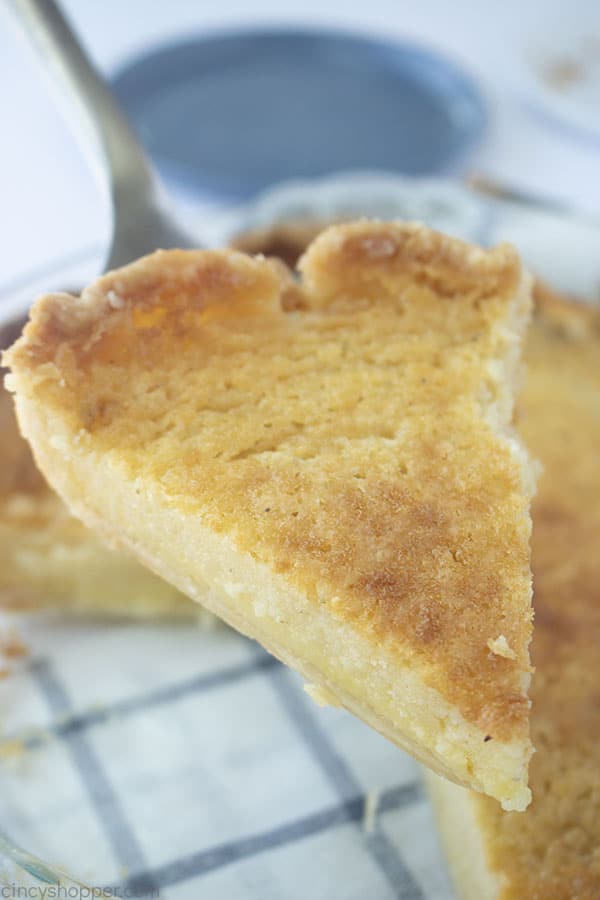 Slice of buttermilk pie on a server