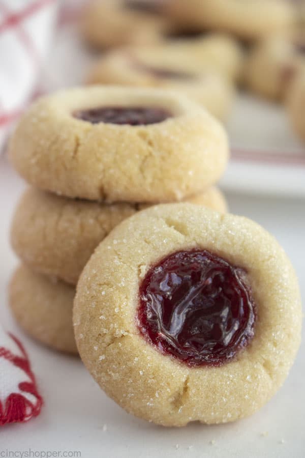 Stack of Thumbprint cookies with raspberry jam