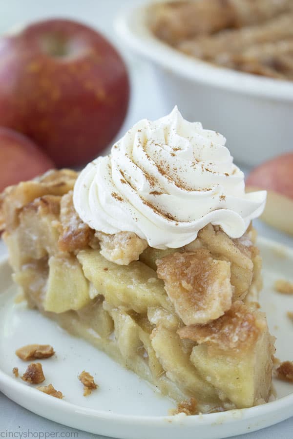 Traditional Apple Pie with lattice crust topping and whipped cream