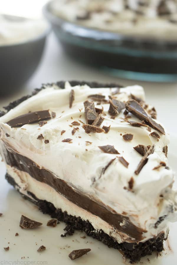 Triple Layer Chocolate Cream pie slice on a plate