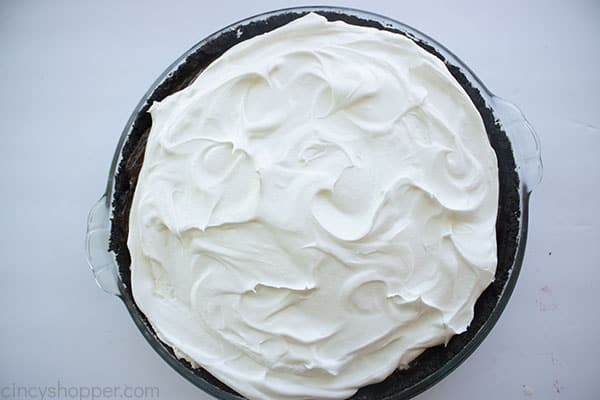 Whipped topping added to pudding layer