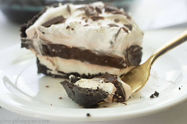 Slice of no bake chocolate cream pie with a fork