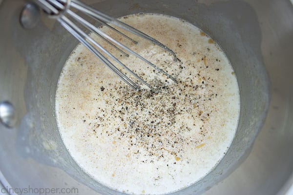 Adding spices to cheese sauce
