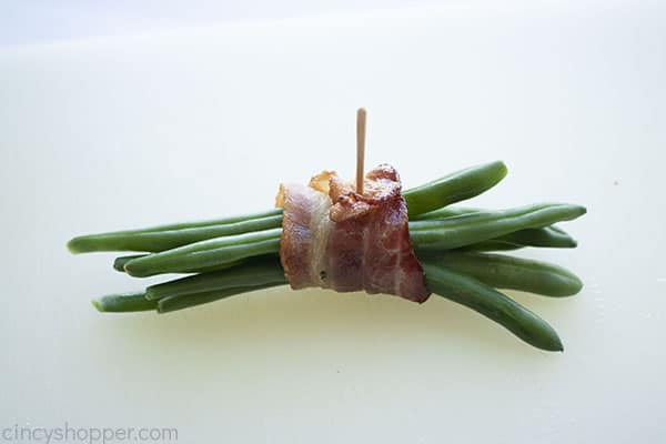 Bacon wrapped bundle of green beans with toothpick