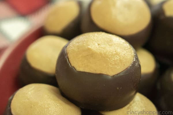 Chocolate dipped peanut butter candy Buckeye on a plate