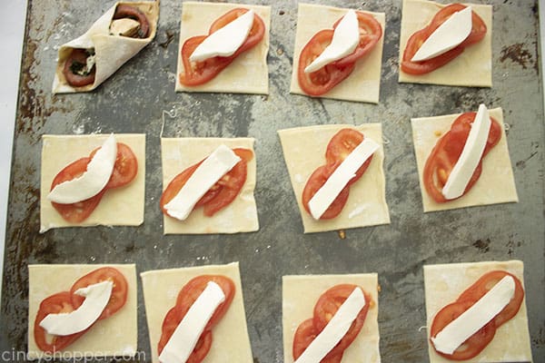 Mozzarella cheese added to top of the tomatoes