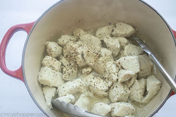 Chicken cooking in Dutch oven