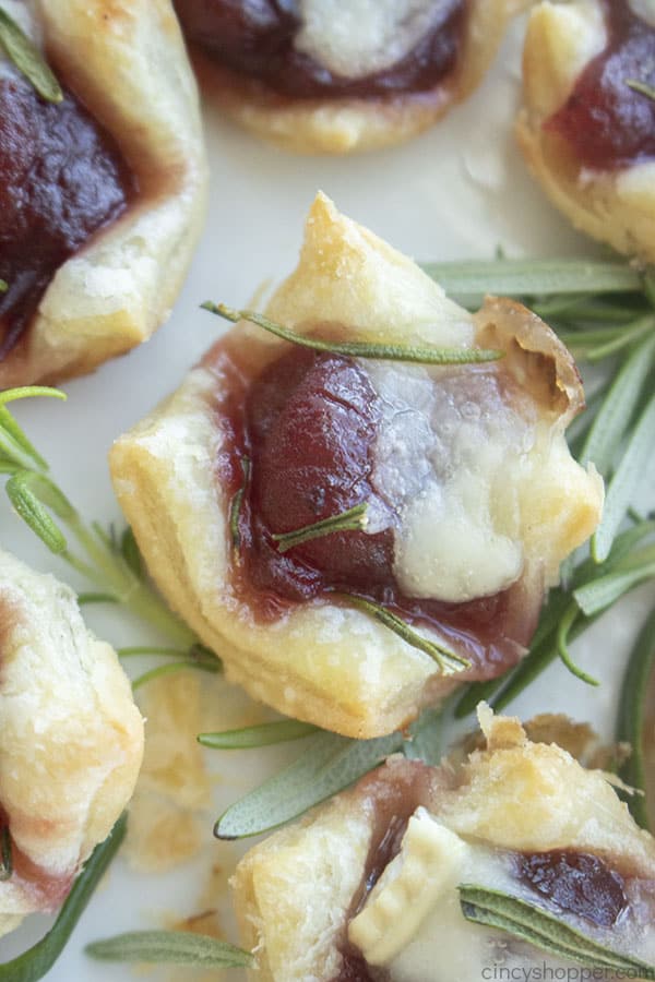 Cranberry Brie Appetizer on a platter with rosemary