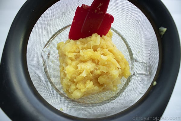 Draining crushed pineapple