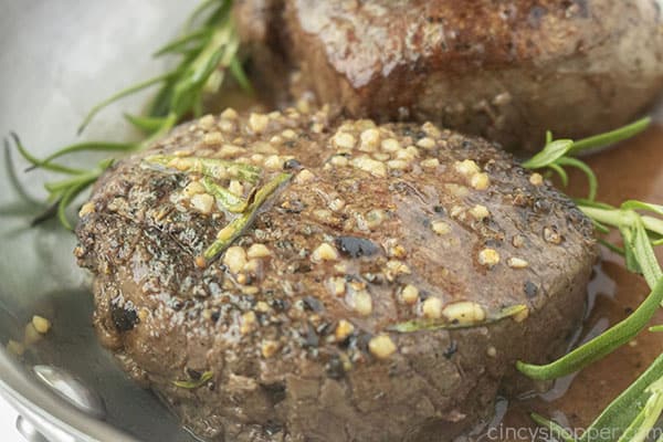 Beef tenderloin filets in a pan