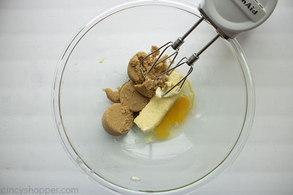 Sugar butter and egg in bowl for cookie dough