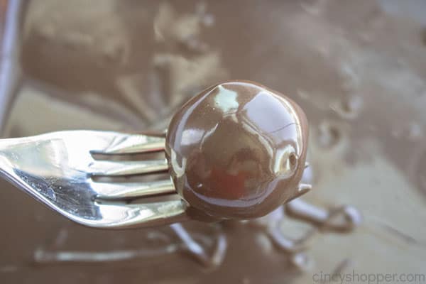 Chocolate covered truffle on a fork
