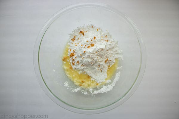 Orange cookie glaze ingredients in a bowl