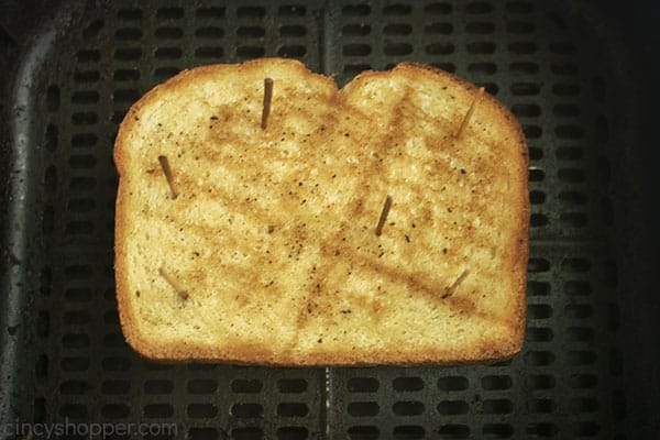 Toasted grilled cheese in air fryer basket