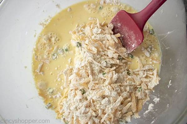 Wet ingredients added to be mixed for bread