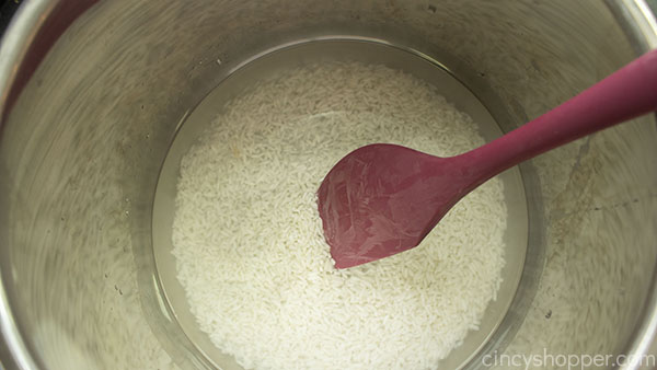 Water and salt added to rice