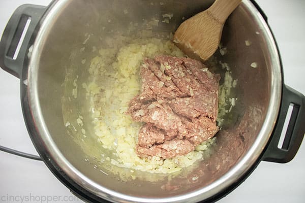 Beef and onions in pressure cooker