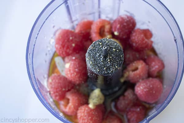 Raspberry dressing ingredients in a blender