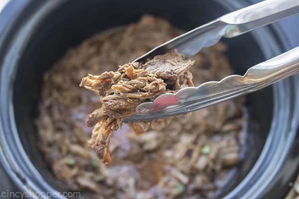 Slow Cooker Barbacoa with tongs