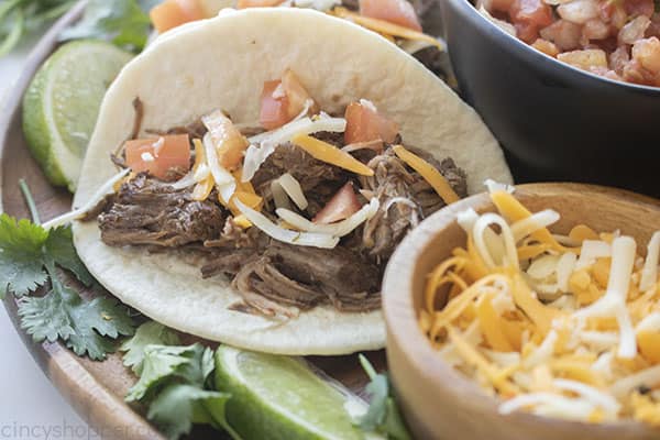 Beef Barbacoa tacos with toppings