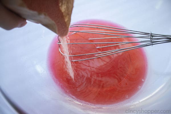 Adding jello packet to boiling water