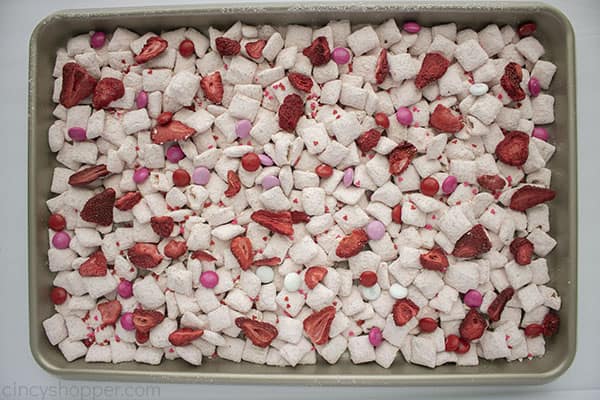 Strawberry Puppy Chow on sheet pan