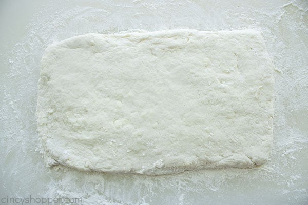 Biscuit dough shaped into a rectangle