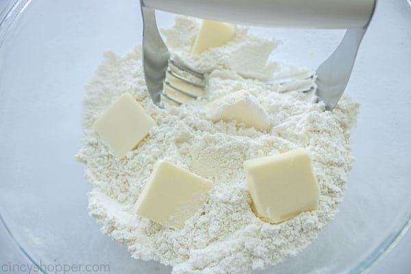 Cut butter slices added to dry ingredients 