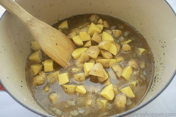 Potatoes added to pot