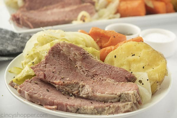 Cooked Corned Beef with vegetables on plate