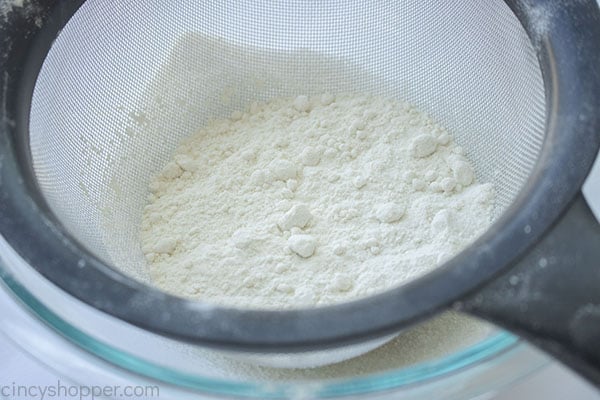 Sifting dry biscuit ingredients