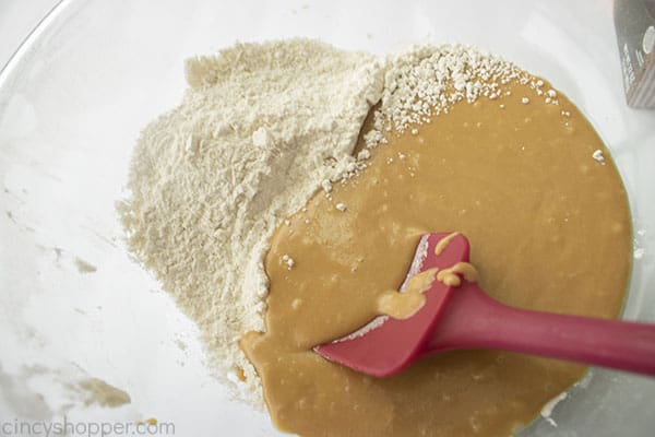 Dry ingredients added to peanut butter mixture