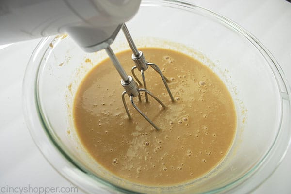 Beating the peanut butter mixture for bread