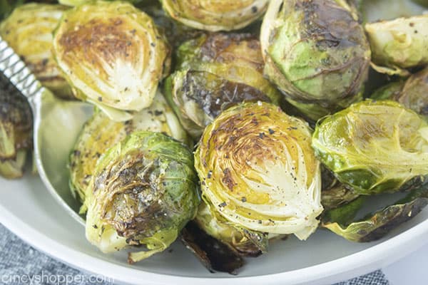 Oven Brussel Sprouts in a bowl with a spoon