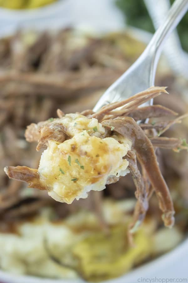 Mississippi Pot Roast with mashed potatoes on a fork