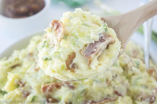 Colcannon potatoes on a wooden spoon