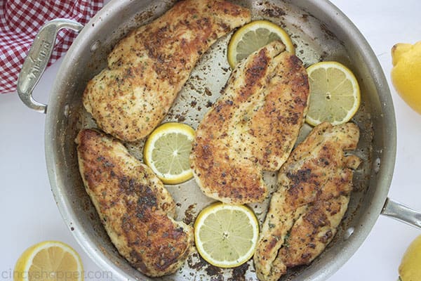 Pan seared lemon pepper chicken in a pan