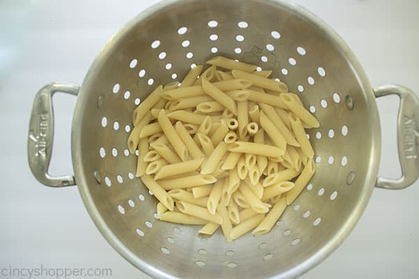 Cooked Penne Pasta in a collander