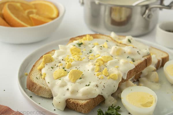 Creamed eggs on toast with hard boiled egg