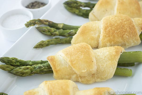 Wrapped asparagus on a platter