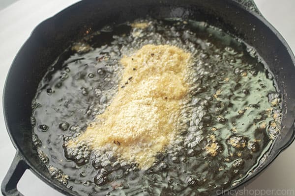 Fish frying in oil