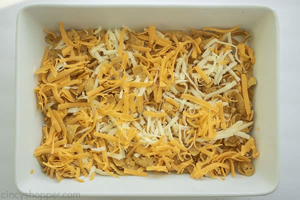 Cheese added to top of Fritos